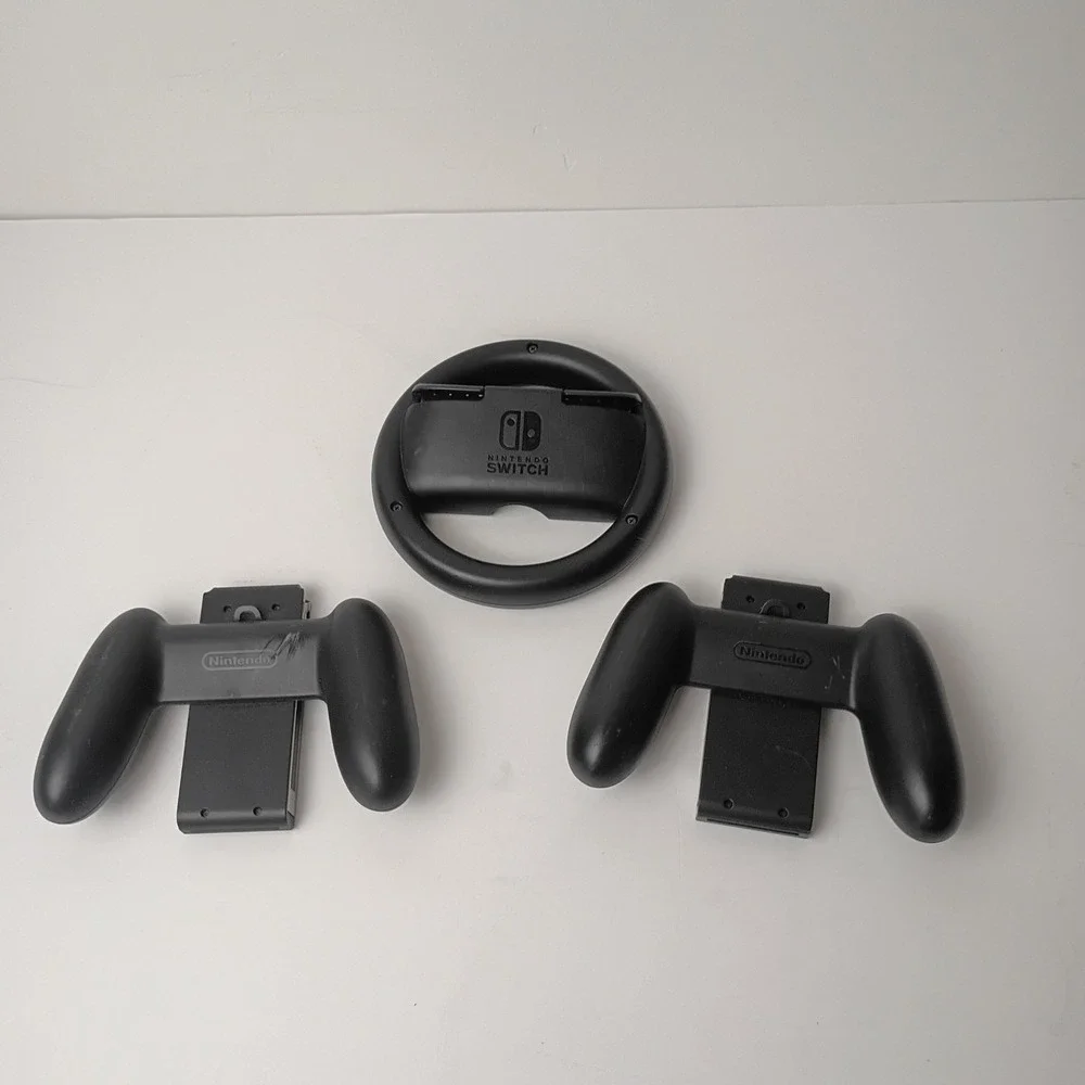 Nintendo Switch Game Accessories: 1 Steering Wheel and 2 Controller Grips